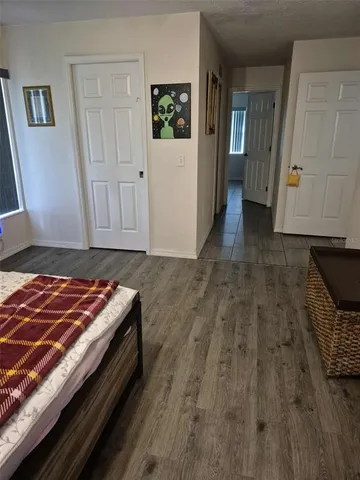 a hallway with a bed