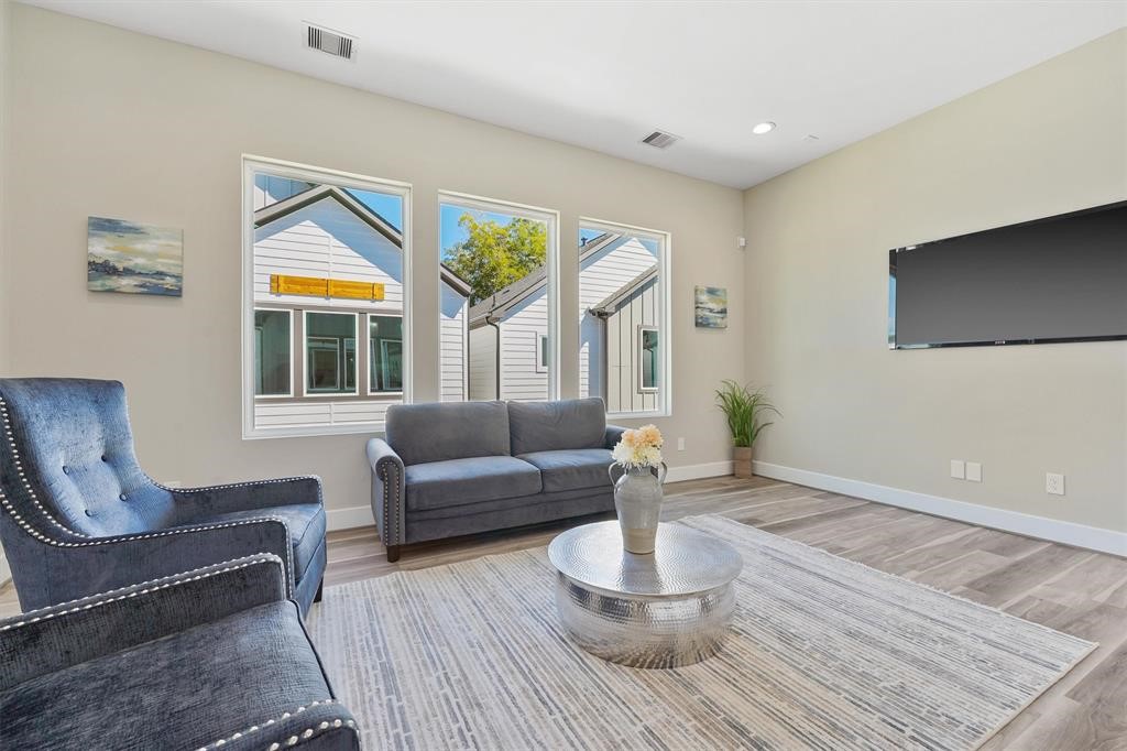 2504 West Tidwell Road, Unit G Houston, TX 77091 - Photo 3 of 30 a living room with furniture
