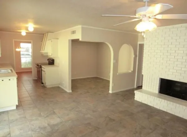 a view of a livingroom with a fireplace