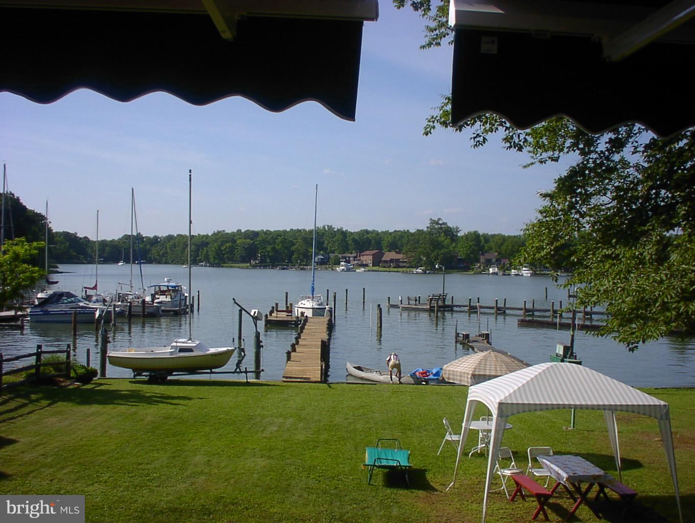 2124 Poplar Road Baltimore, MD 21221 - Photo 1 of 29 a view of a lake with sitting area
