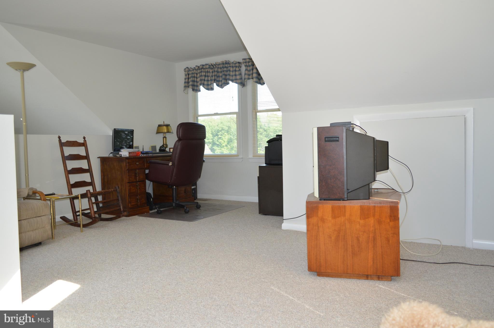 2124 Poplar Road Baltimore, MD 21221 - Photo 11 of 29 a view of workspace with furniture and window