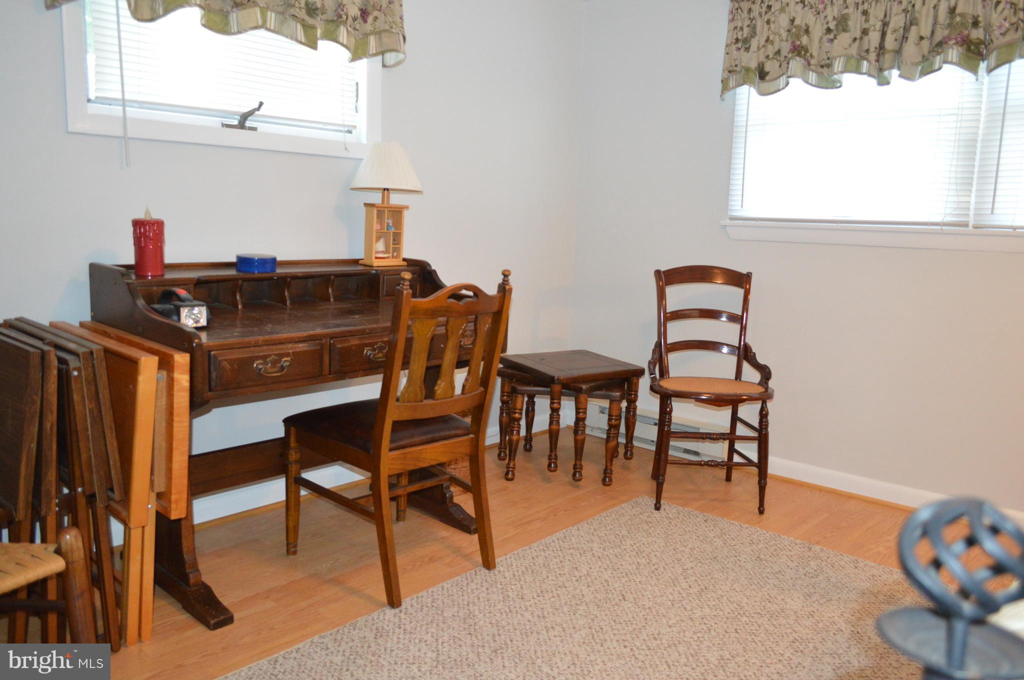2124 Poplar Road Baltimore, MD 21221 - Photo 22 of 29 a dining room with furniture and window