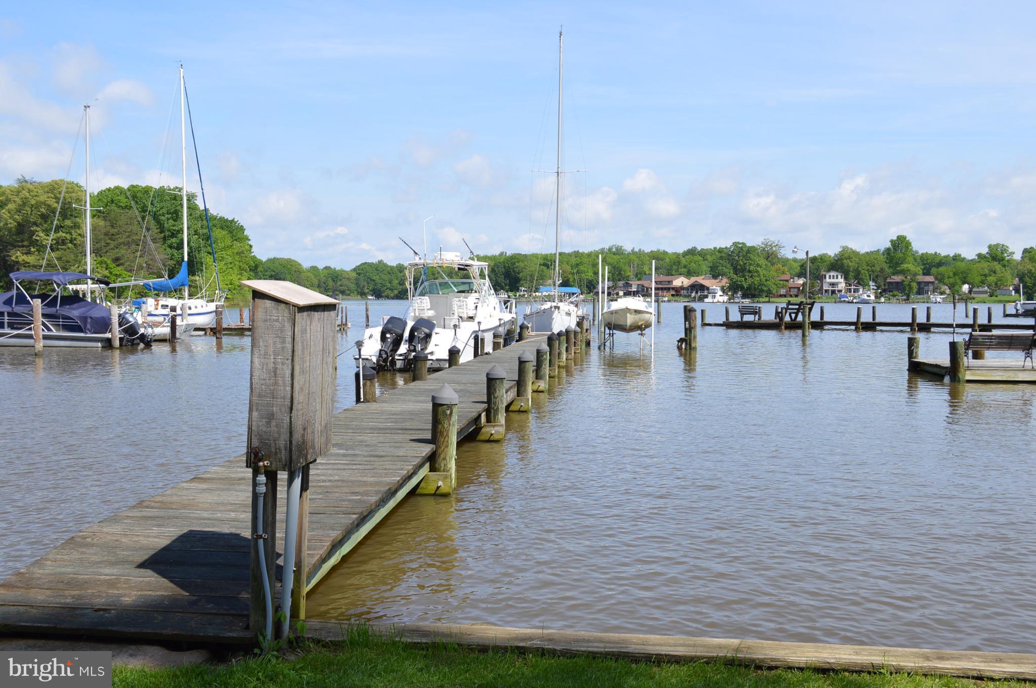 2124 Poplar Road Baltimore, MD 21221 - Photo 7 of 29 a view of a lake with boats next to a lake