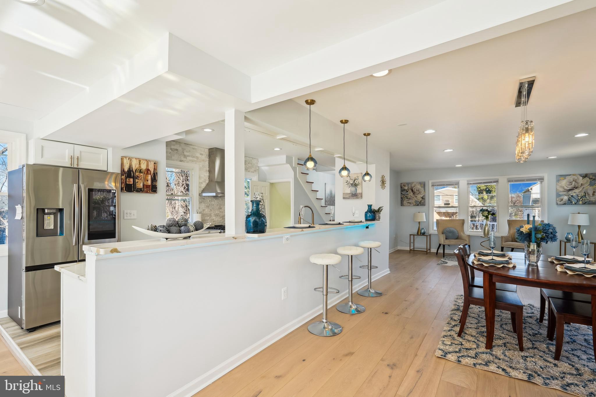 2528 Elvans Road Southeast Washington, DC 20020 - Photo 2 of 31 a living room with stainless steel appliances furniture a dining table and chairs