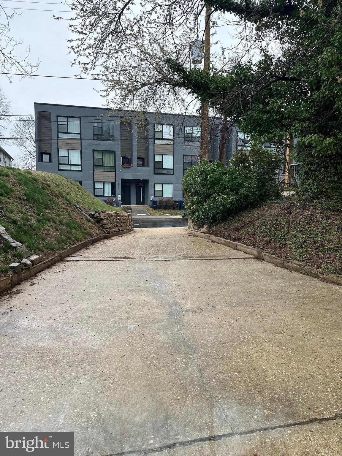 2528 Elvans Road Southeast Washington, DC 20020 - Photo 22 of 31 a front view of residential houses with yard