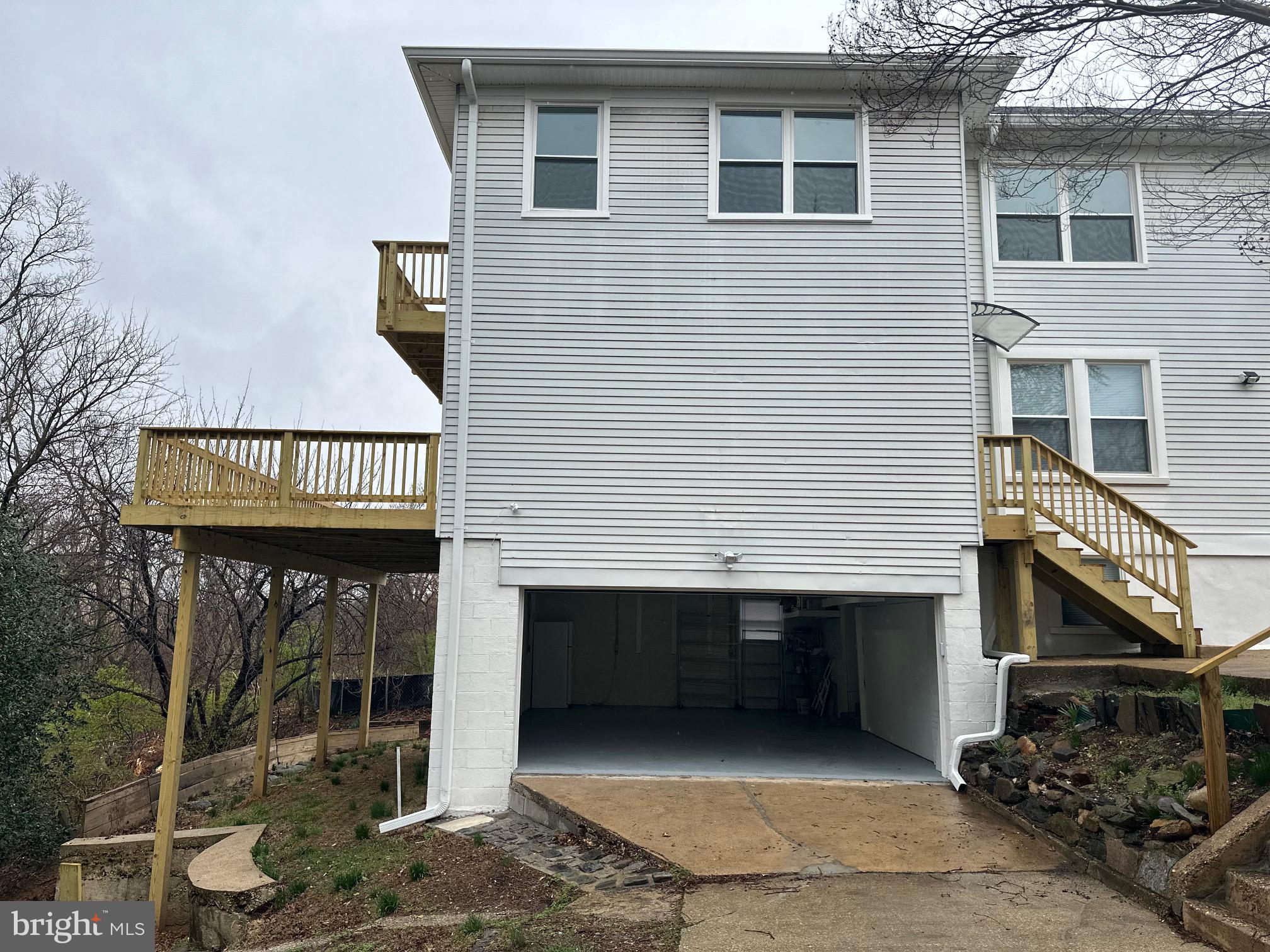 2528 Elvans Road Southeast Washington, DC 20020 - Photo 23 of 31 a front view of a house with parking