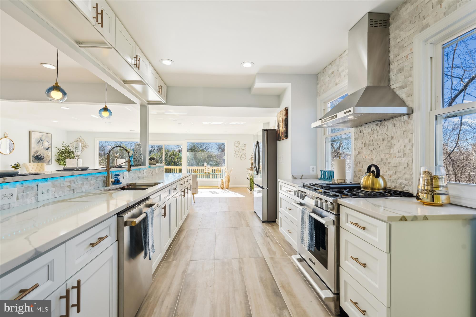 2528 Elvans Road Southeast Washington, DC 20020 - Photo 3 of 31 a large kitchen with a stove top oven