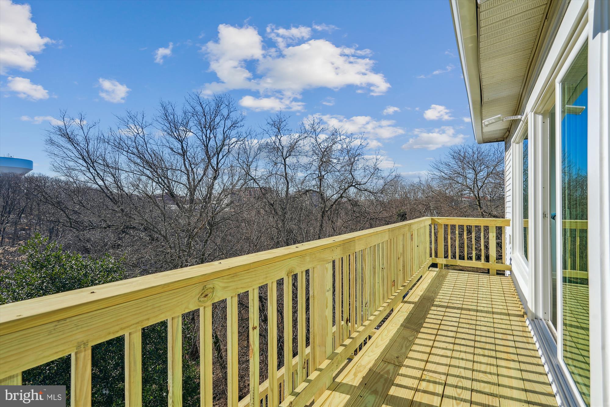 2528 Elvans Road Southeast Washington, DC 20020 - Photo 9 of 31 a view of balcony with wooden floor