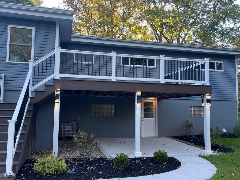 815 Sugar Road Akron, OH 44321 - Photo 5 of 22 Composite Deck and Lower Walk-Out Lighted Patio Area