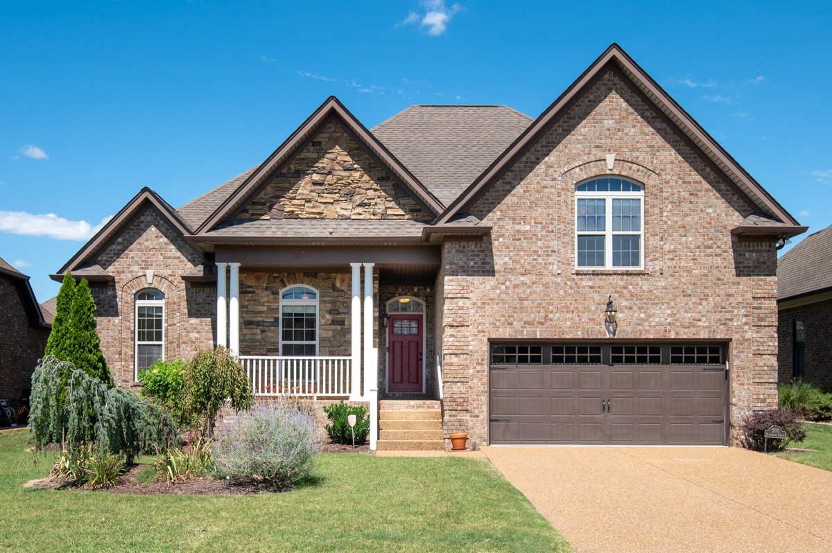2011 Stonebrook Circle Mount Juliet, TN 37122 - Photo 1 of 39 a front view of a house with a yard