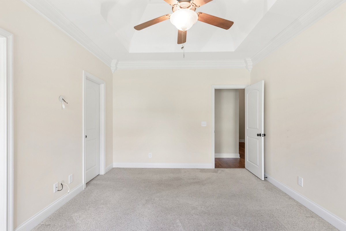 2011 Stonebrook Circle Mount Juliet, TN 37122 - Photo 19 of 39 an empty room with a chandelier fan and closet