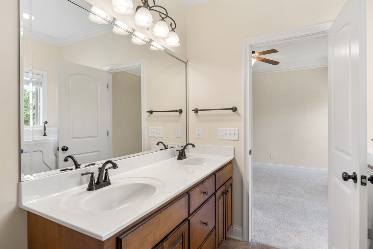 2011 Stonebrook Circle Mount Juliet, TN 37122 - Photo 22 of 39 a bathroom with a sink vanity and a mirror