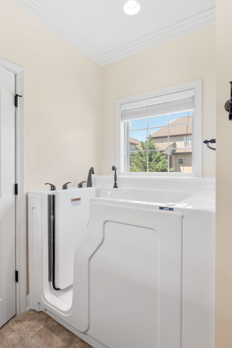 2011 Stonebrook Circle Mount Juliet, TN 37122 - Photo 23 of 39 a bathroom with a shower and a sink