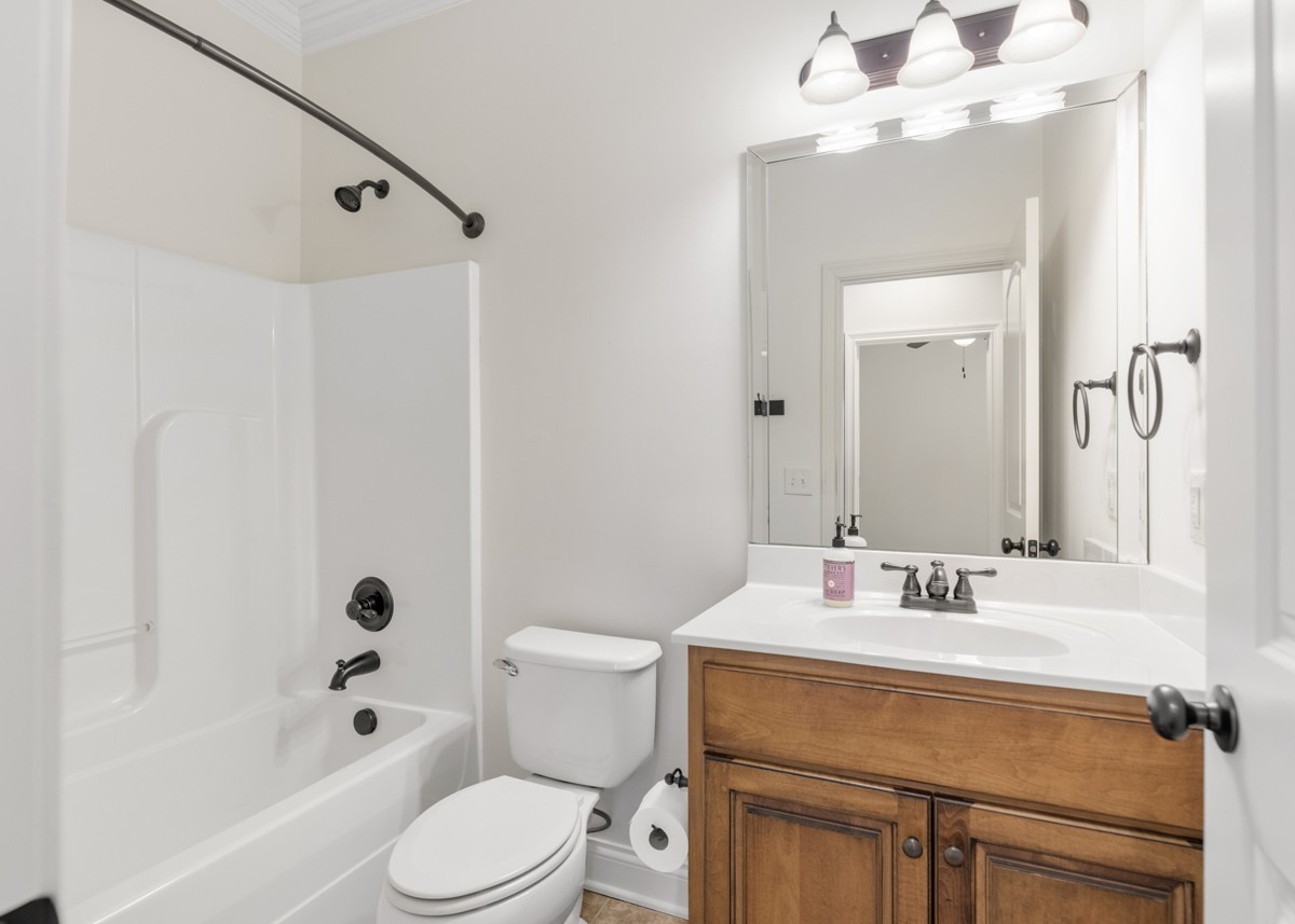 2011 Stonebrook Circle Mount Juliet, TN 37122 - Photo 26 of 39 a bathroom with a sink toilet vanity and shower