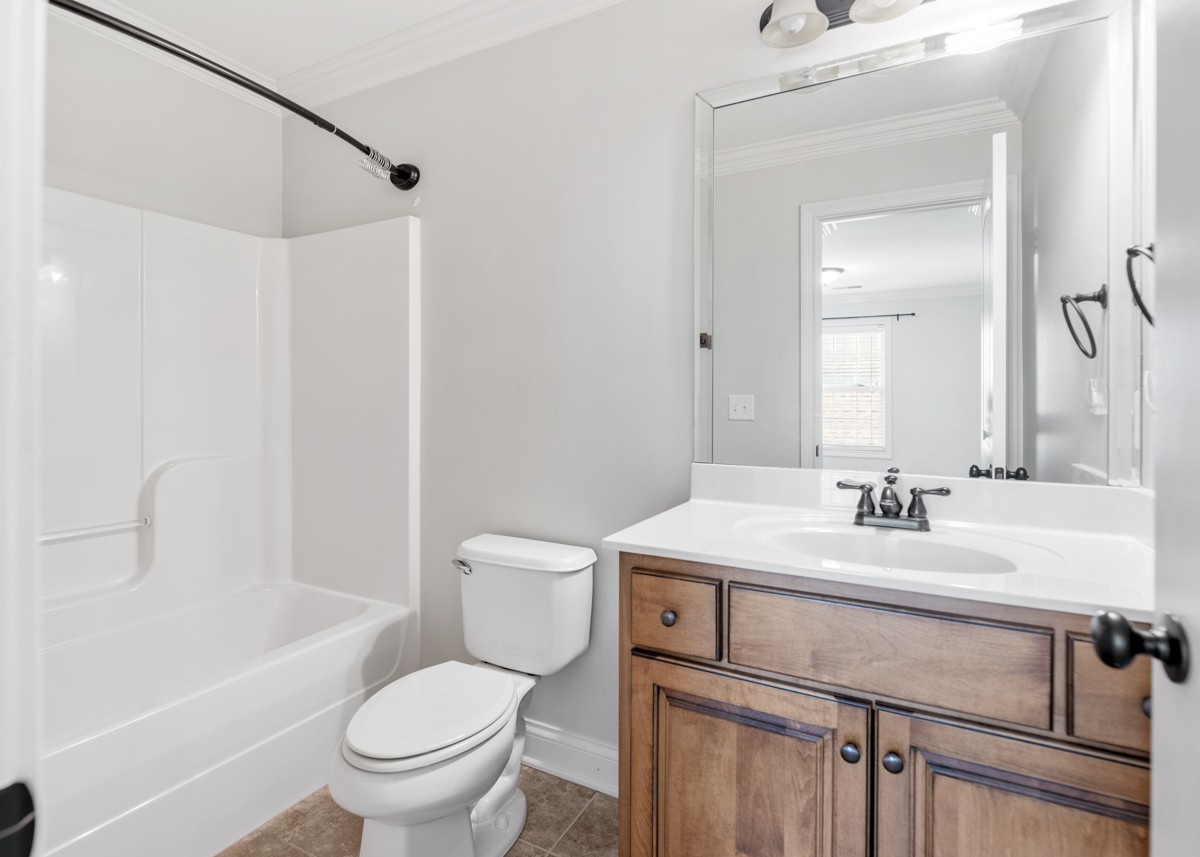 2011 Stonebrook Circle Mount Juliet, TN 37122 - Photo 34 of 39 a bathroom with a sink toilet vanity and tub