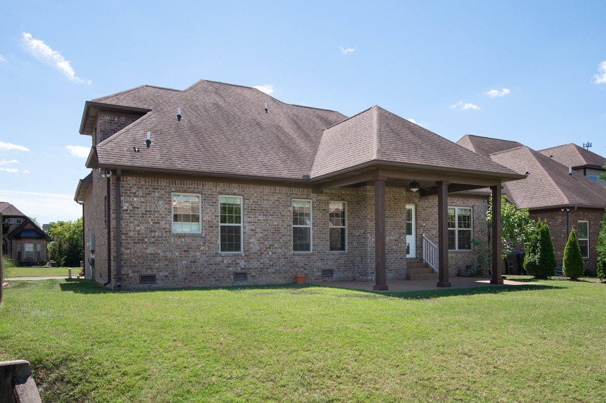 2011 Stonebrook Circle Mount Juliet, TN 37122 - Photo 4 of 39 a front view of a house with garden