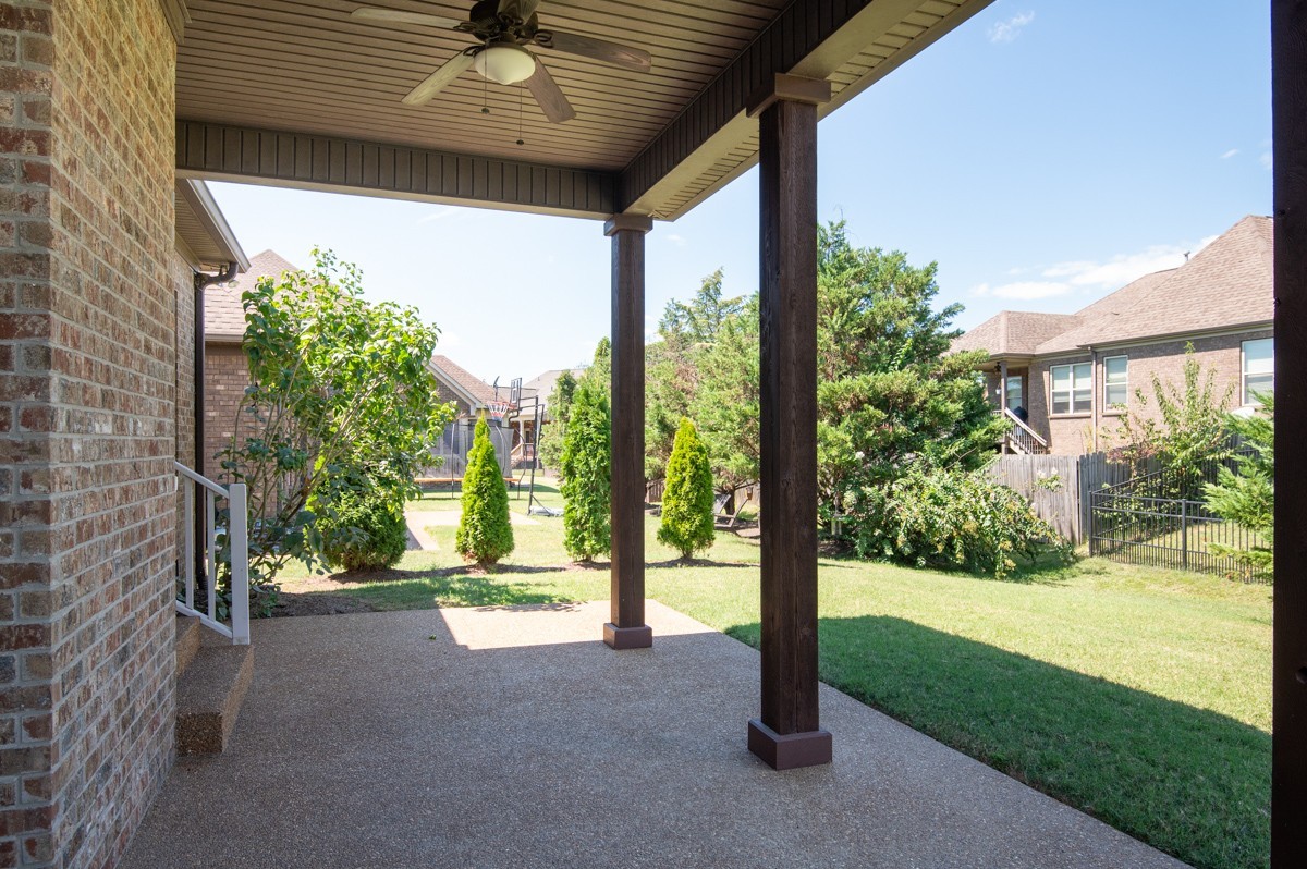 2011 Stonebrook Circle Mount Juliet, TN 37122 - Photo 6 of 39 a view of a porch with couches and wooden fence