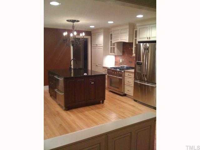 7116 Rainwater Road Raleigh, NC 27615 - Photo 4 of 12 Alternate view of kitchen showing top of line appliances