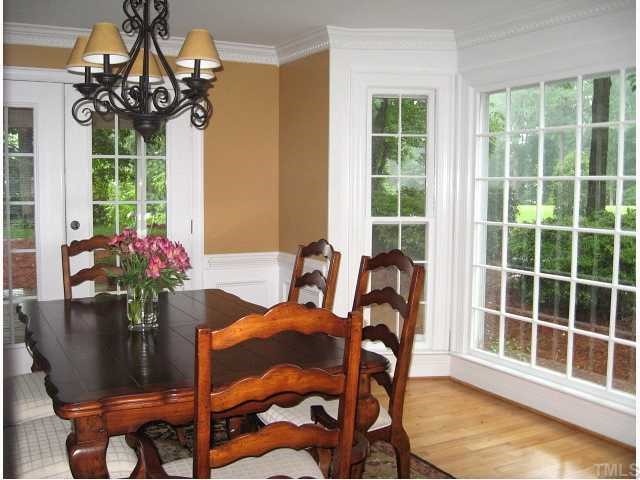7116 Rainwater Road Raleigh, NC 27615 - Photo 5 of 12 Bright dining area with bay window & chair rail/wainscot