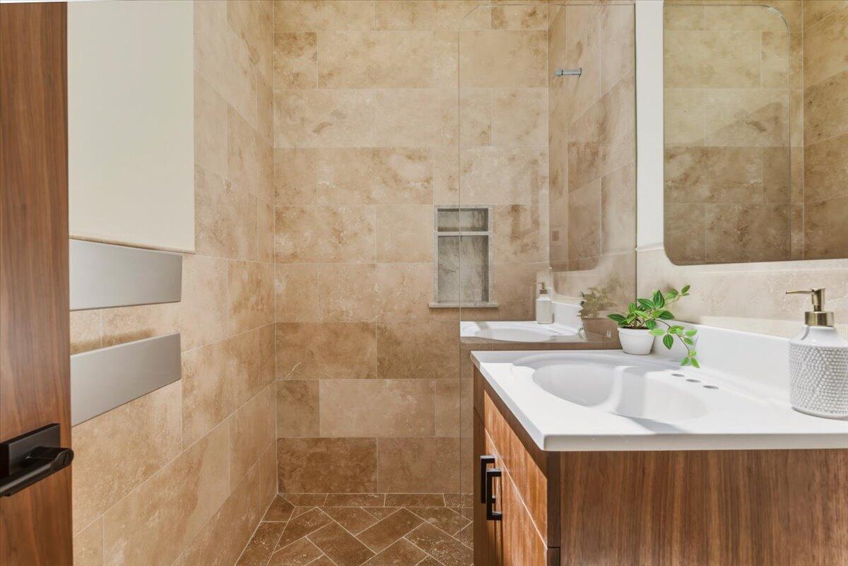 151 Kinman Avenue Goleta, CA 93117 - Photo 12 of 20 a bathroom with a sink and a mirror
