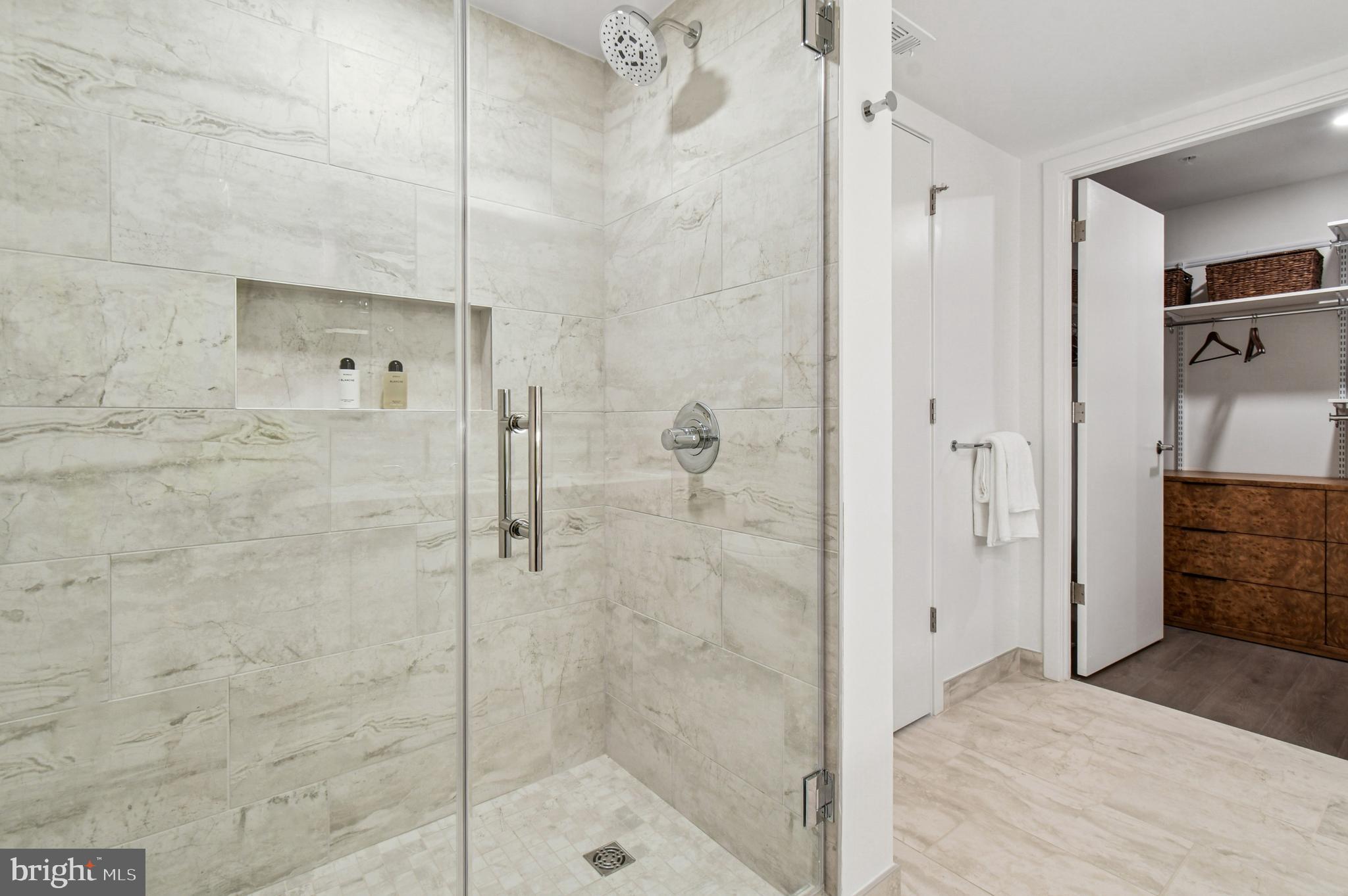 2650 Woodley Road Northwest, Unit 621 Washington, DC 20008 - Photo 14 of 36 a bathroom with a shower