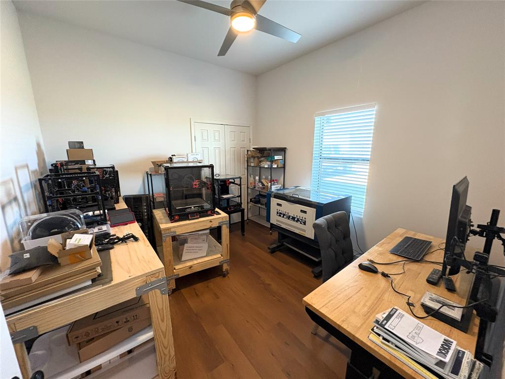 4748 Battle Lake Road Mart, TX 76664 - Photo 15 of 33 Home office featuring a ceiling fan and dark wood finished floors