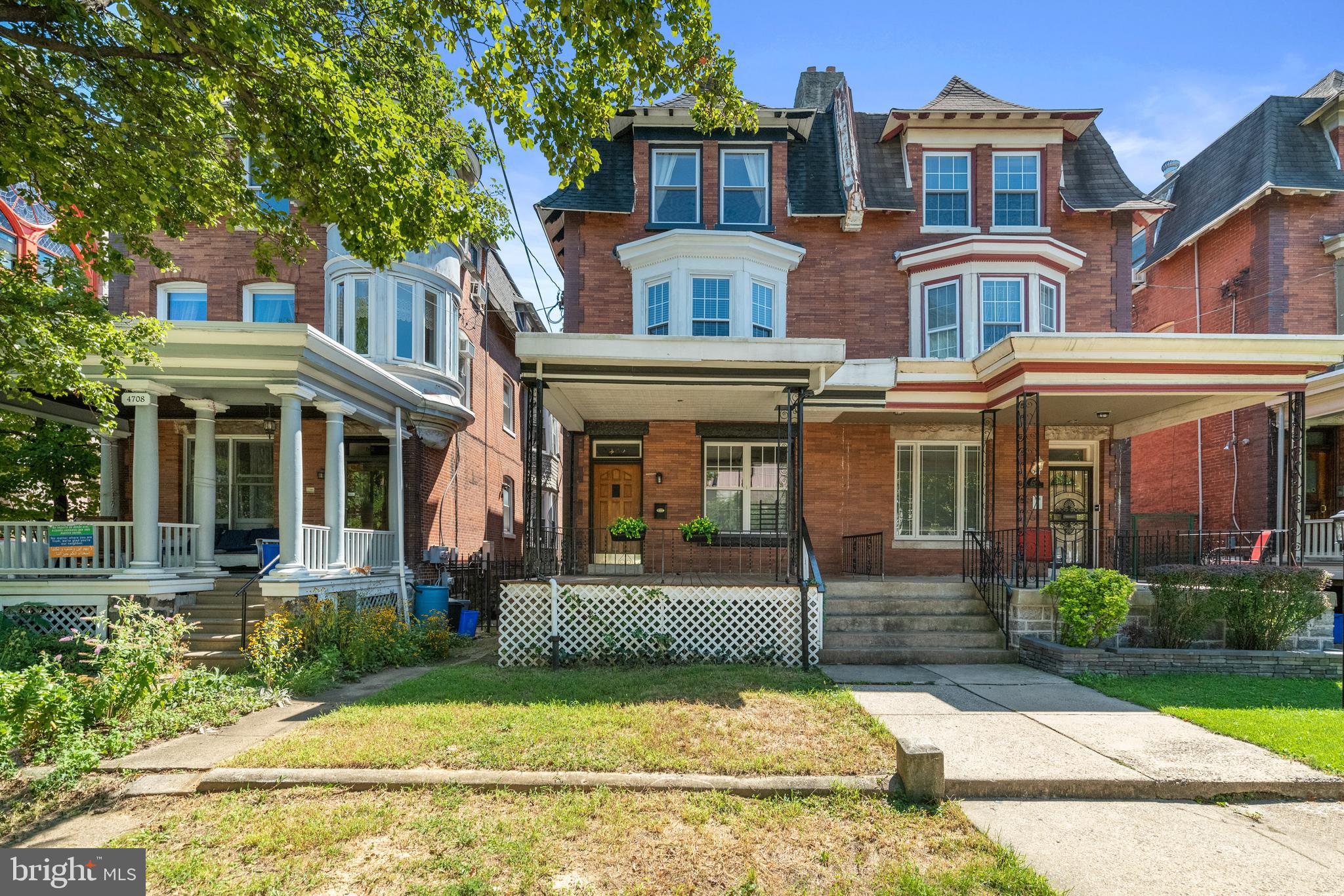 4710 Kingsessing Avenue Philadelphia, PA 19143 - Photo 2 of 30 front view of house with a yard