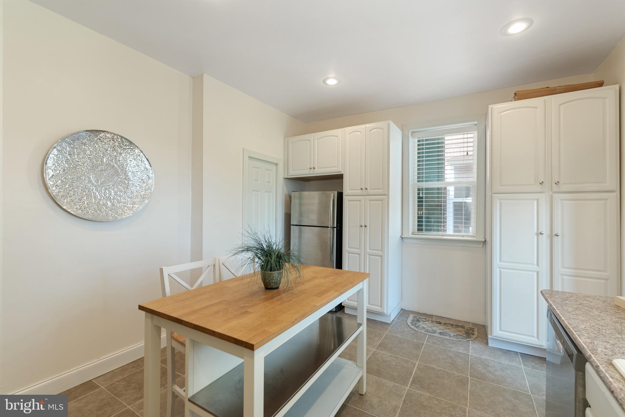 4710 Kingsessing Avenue Philadelphia, PA 19143 - Photo 13 of 30 a room with furniture and window