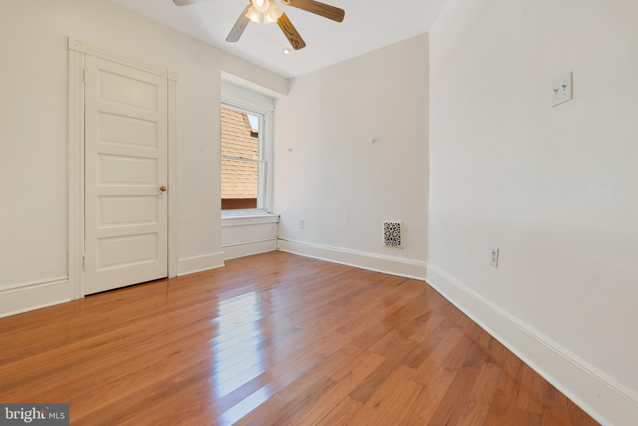 4710 Kingsessing Avenue Philadelphia, PA 19143 - Photo 22 of 30 wooden floor in an empty room