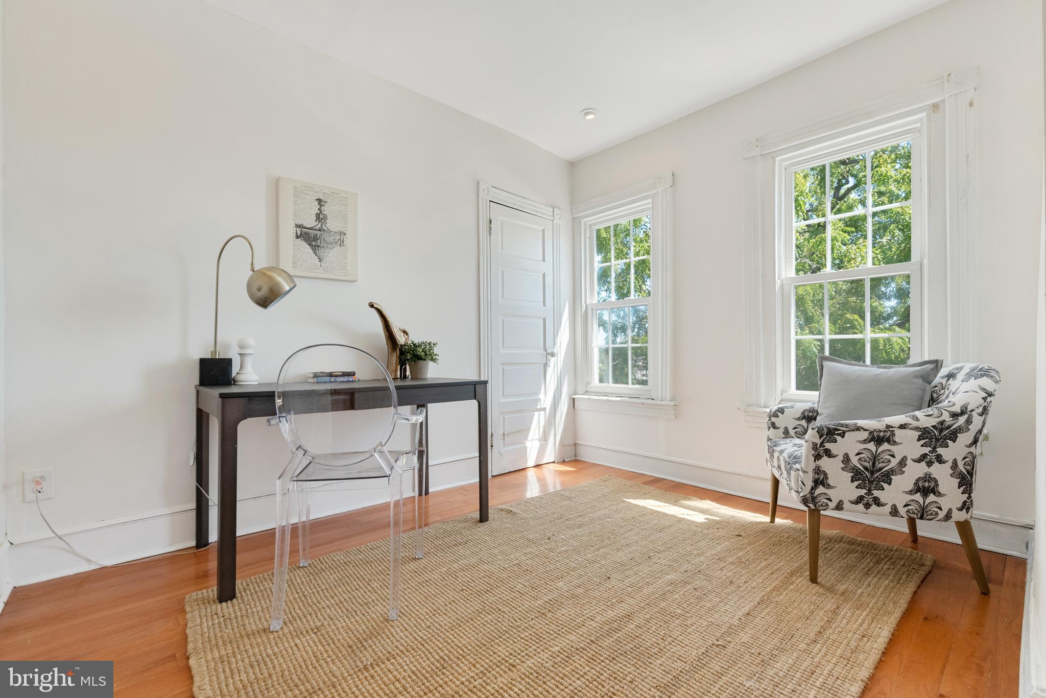4710 Kingsessing Avenue Philadelphia, PA 19143 - Photo 29 of 30 a living room with furniture and a window