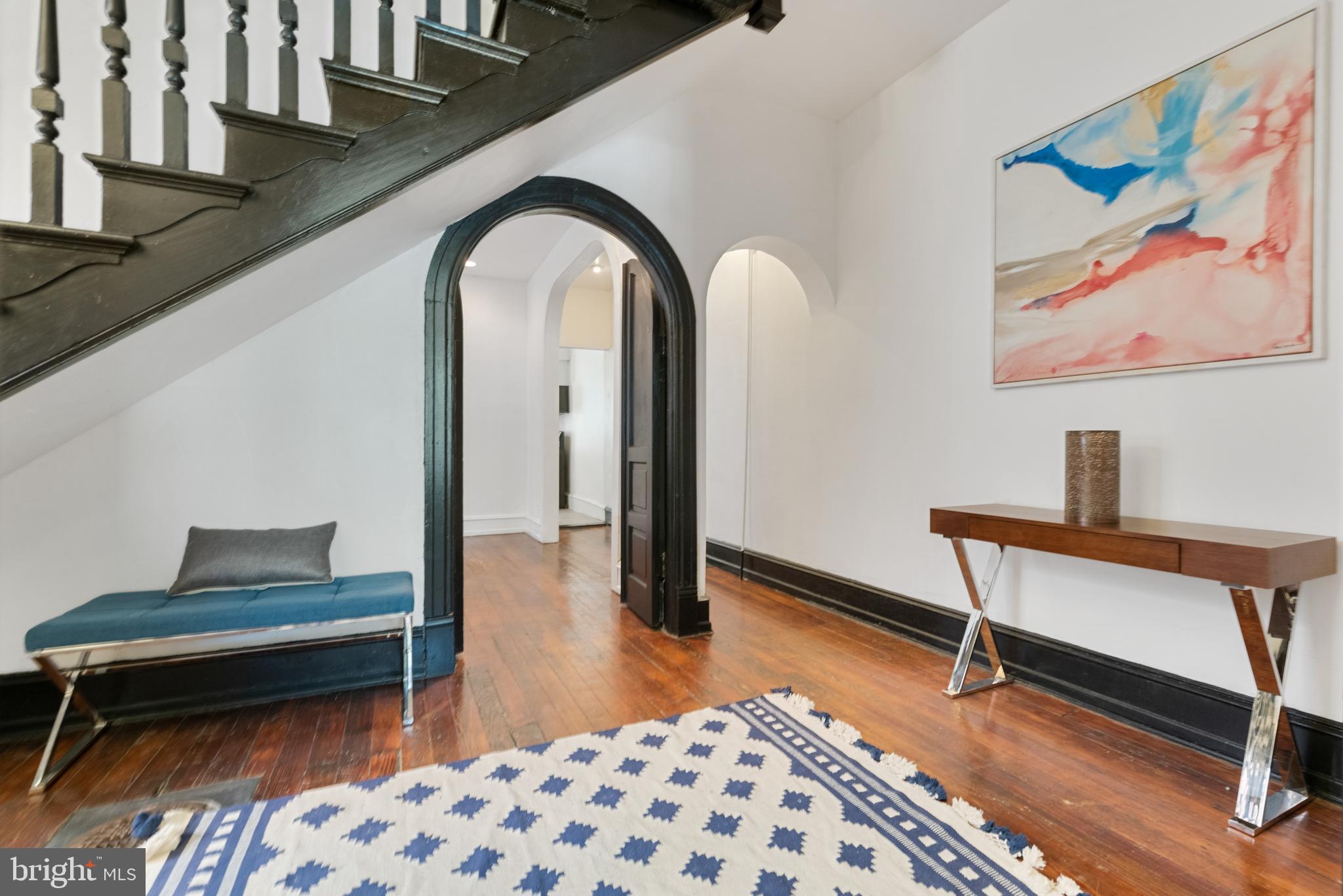 4710 Kingsessing Avenue Philadelphia, PA 19143 - Photo 7 of 30 a bedroom with furniture and a rug