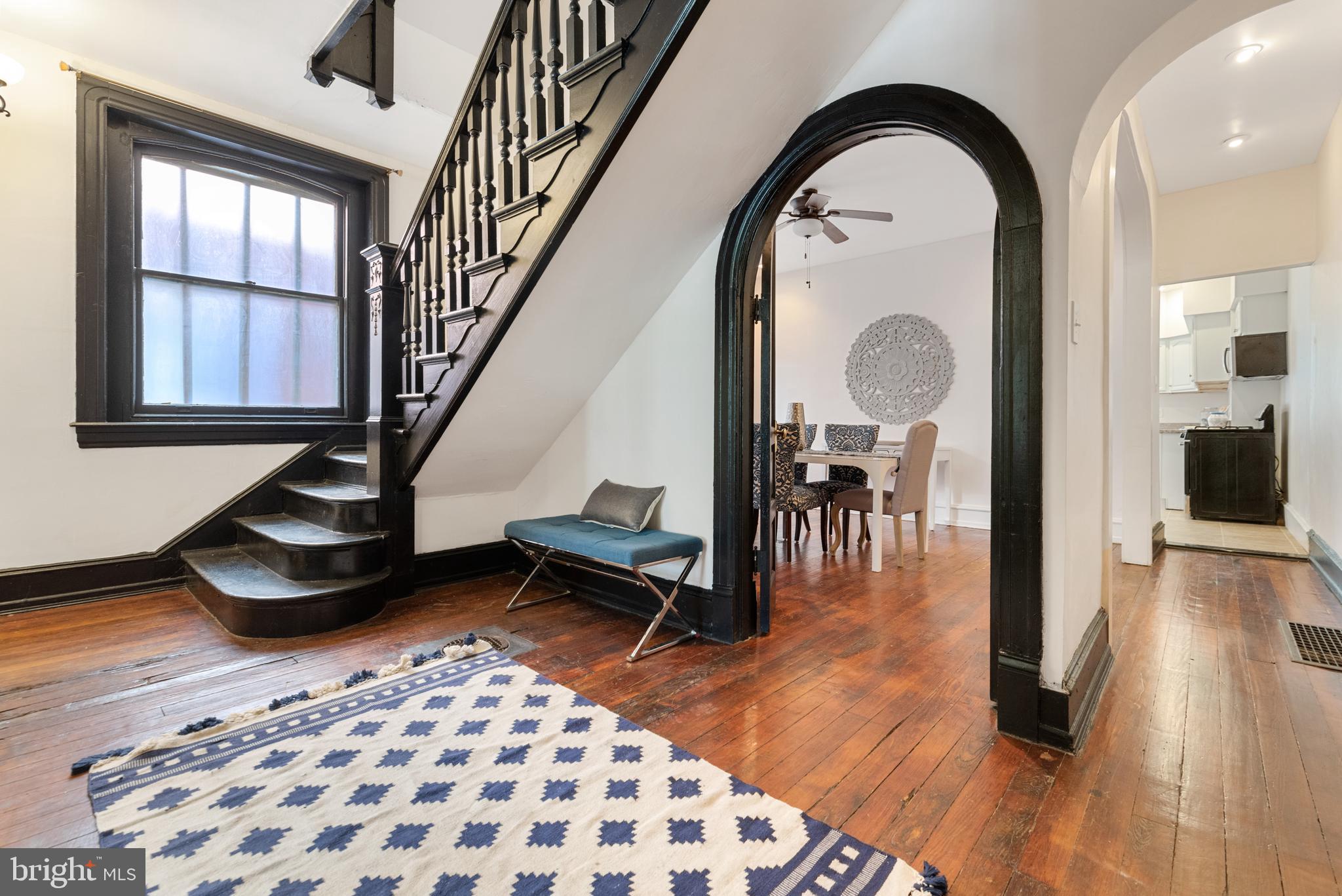 4710 Kingsessing Avenue Philadelphia, PA 19143 - Photo 9 of 30 a view of livingroom with furniture and wooden floor