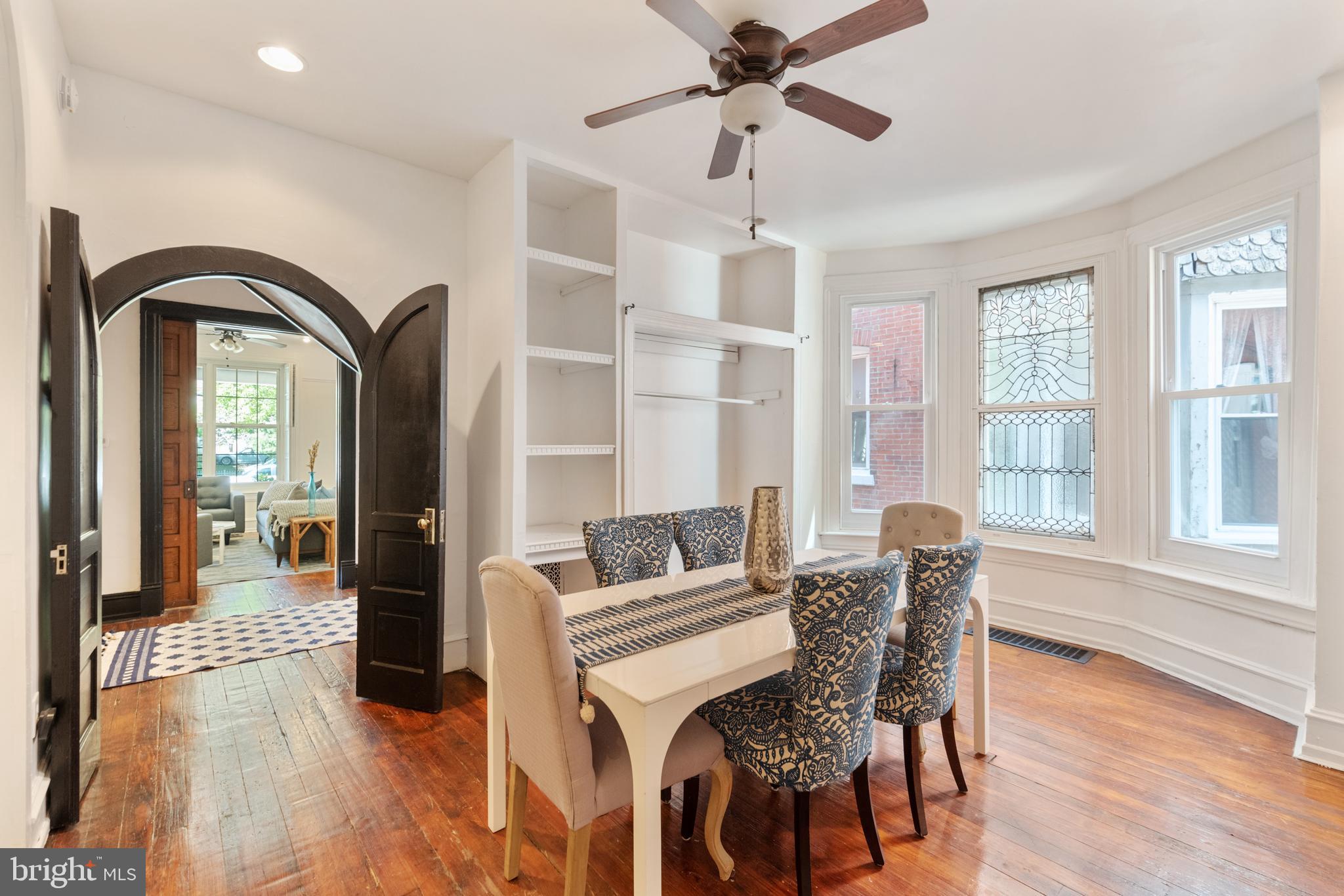 4710 Kingsessing Avenue Philadelphia, PA 19143 - Photo 10 of 30 a living room with furniture and a large window