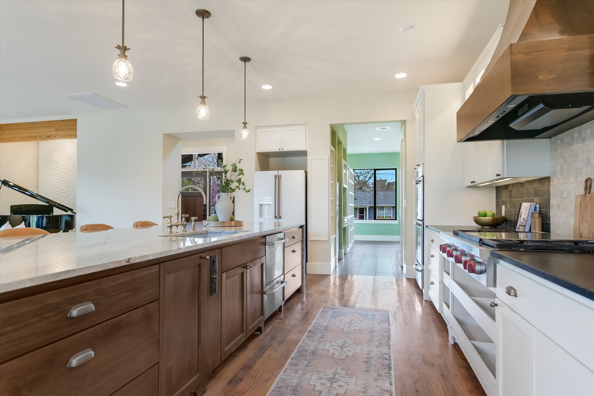 1210 Alguno Road Austin, TX 78757 - Photo 12 of 28 This layout ensures the chef is never to far from the action.