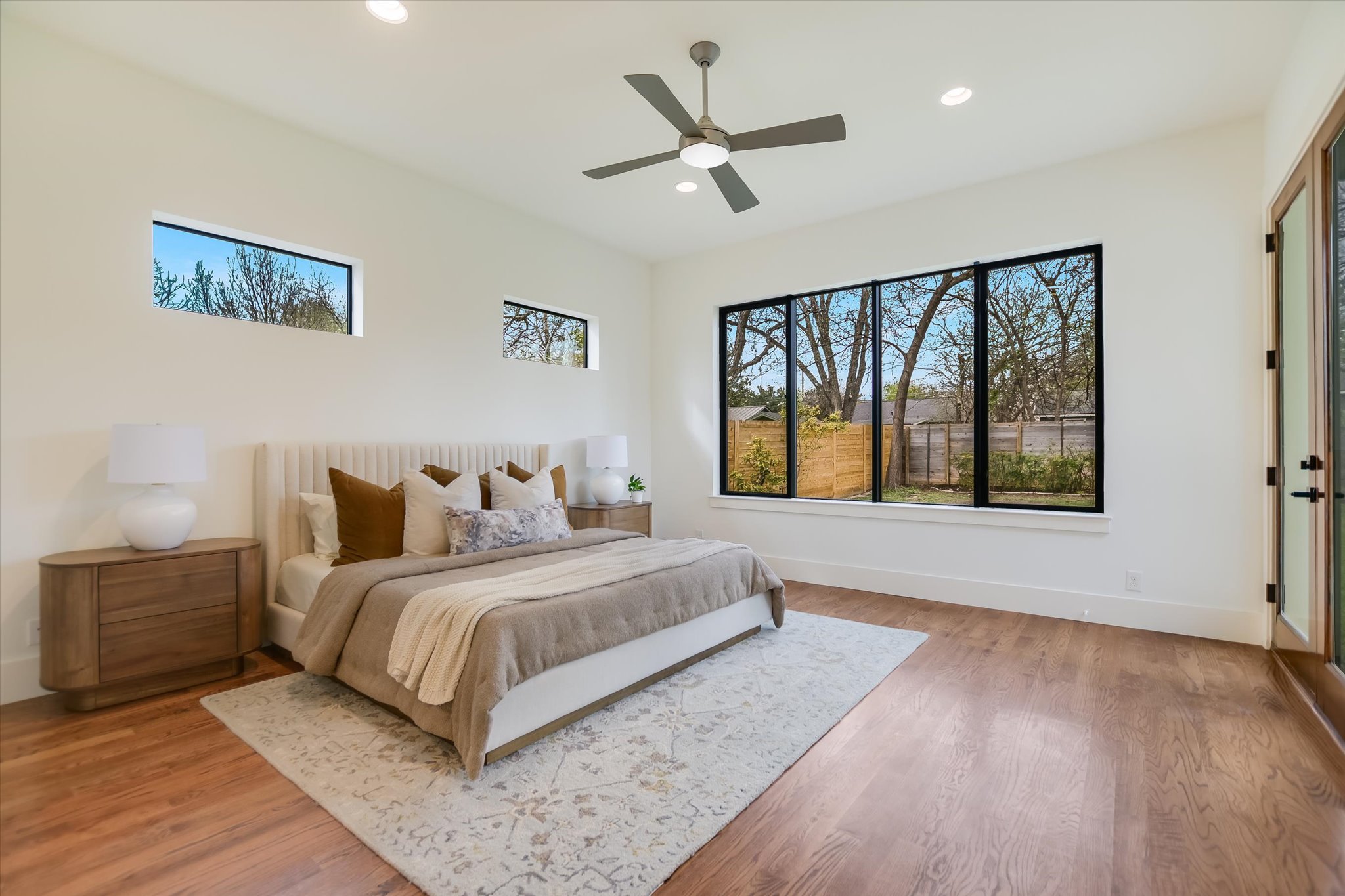 1210 Alguno Road Austin, TX 78757 - Photo 18 of 28 This flexible main level room works nicely for guests, a home office, or both, with direct access to the back patio.