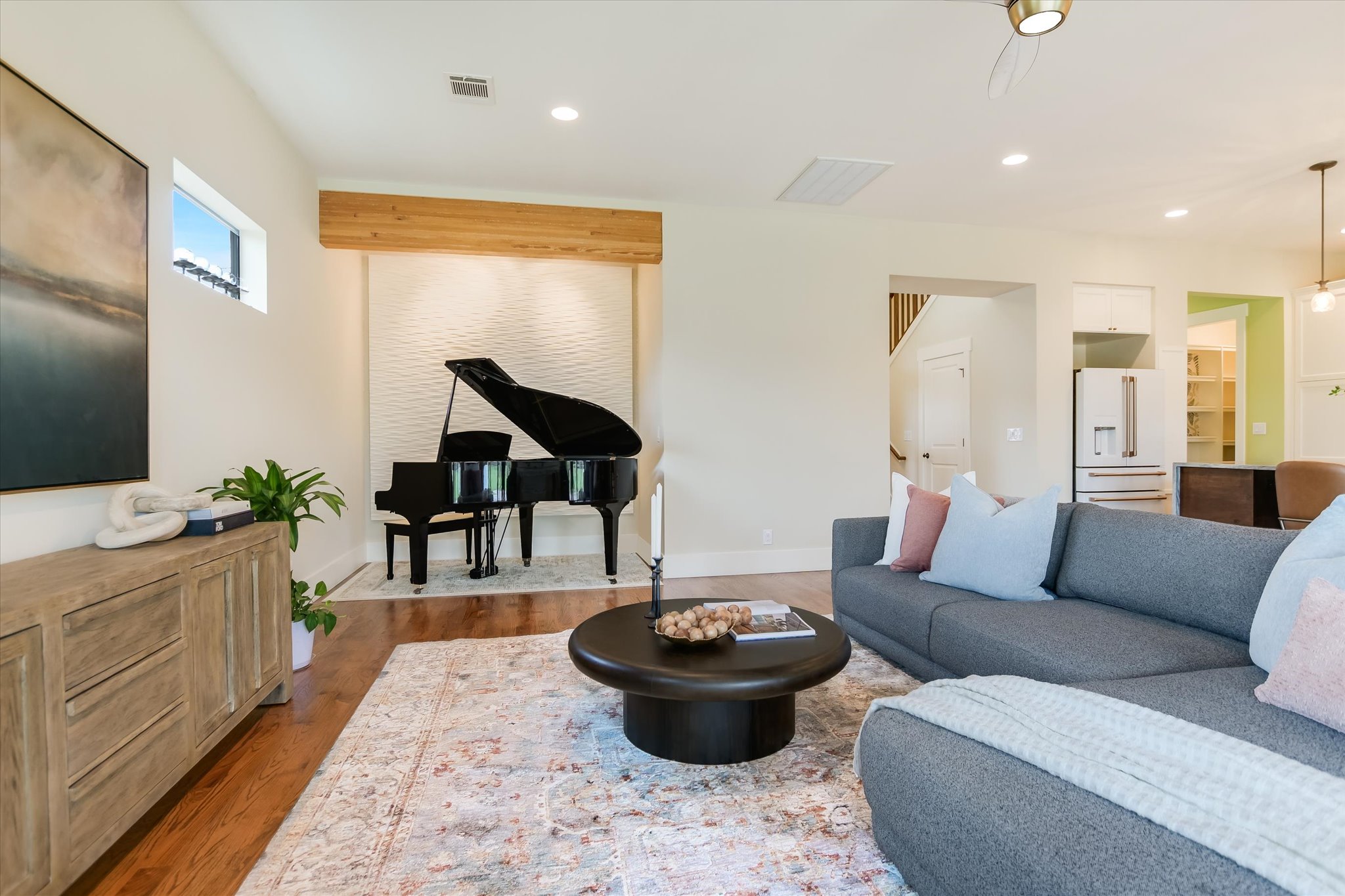 1210 Alguno Road Austin, TX 78757 - Photo 10 of 28 The softly lit alcove creates a striking moment in the living area, adding a layer of warmth and character to the room.