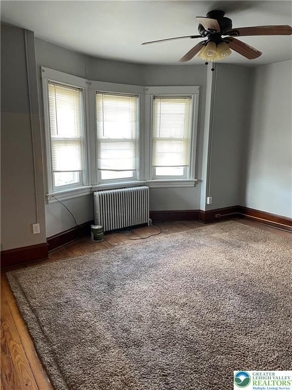 154 West Lincoln Street, Unit 2 Easton, PA 18042 - Photo 4 of 10 an empty room with windows