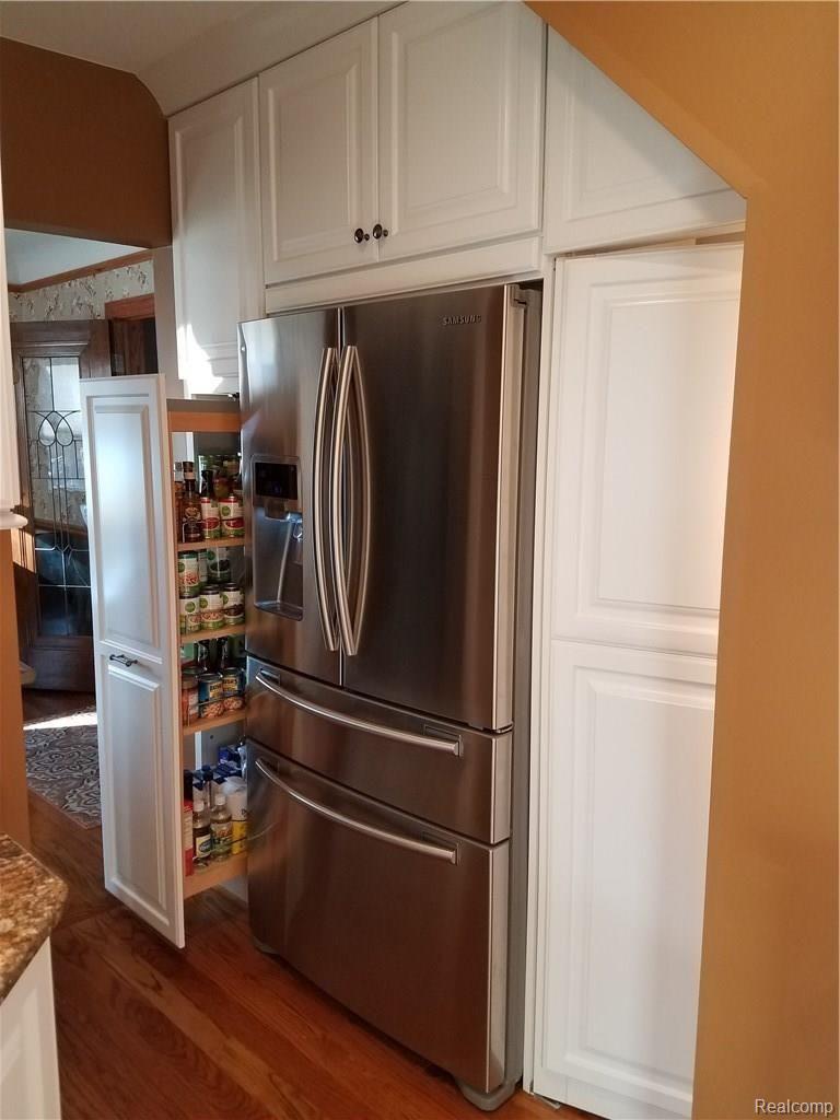 18608 Meridian Road Grosse Ile, MI 48138 - Photo 13 of 31 Pantry & Refrigerator.jpg