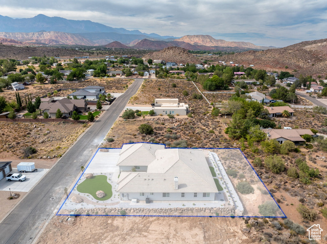 230 Boulder Way Leeds, UT 84746 - Photo 67 of 72 Aerial view of residential area featuring property parcel outlined and a mountainous background