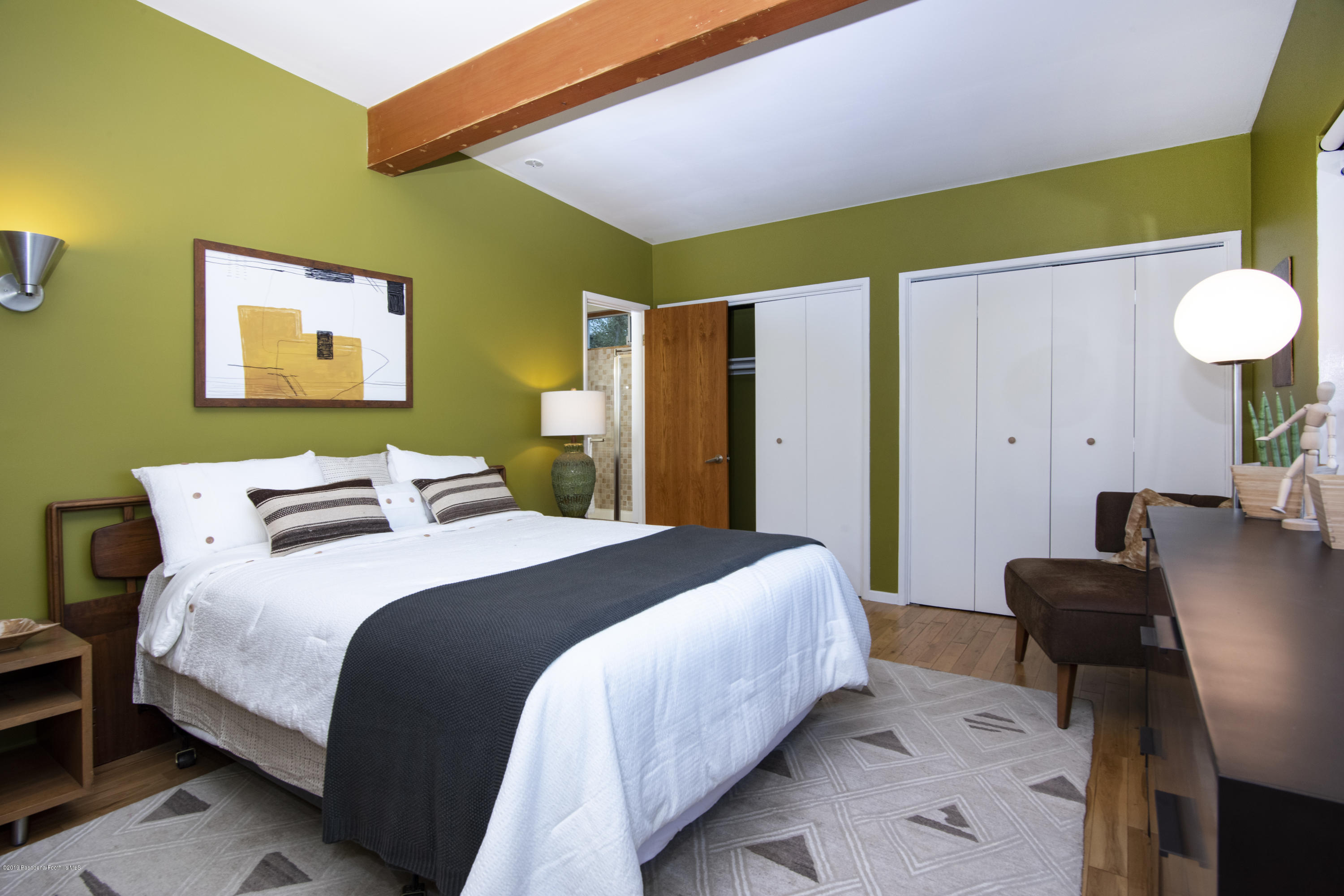 1623 Silverwood Drive Eagle Rock, CA 90041 - Photo 11 of 24 a bedroom with a bed and a painting on the wall