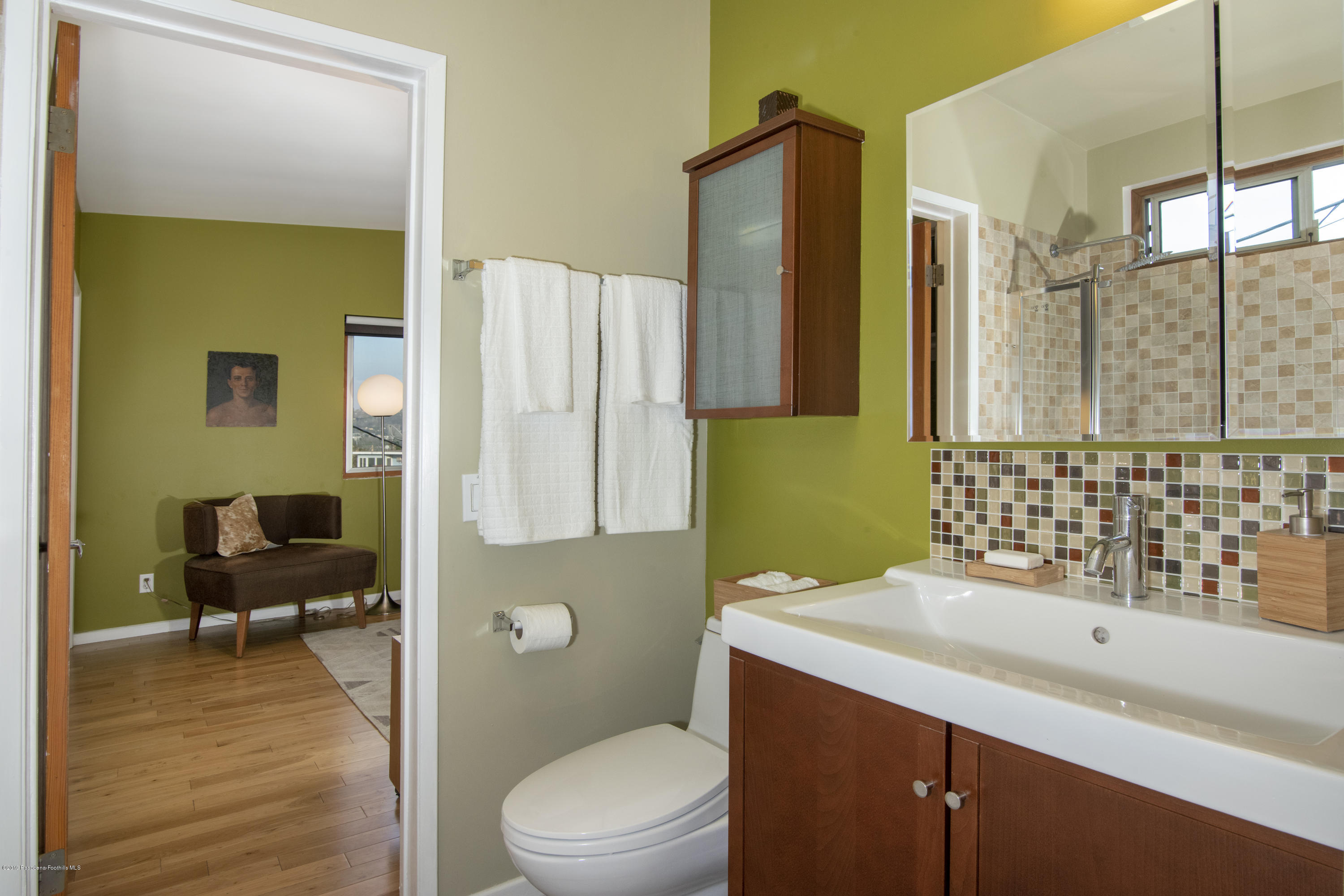 1623 Silverwood Drive Eagle Rock, CA 90041 - Photo 16 of 24 a bathroom with a sink a toilet and shower