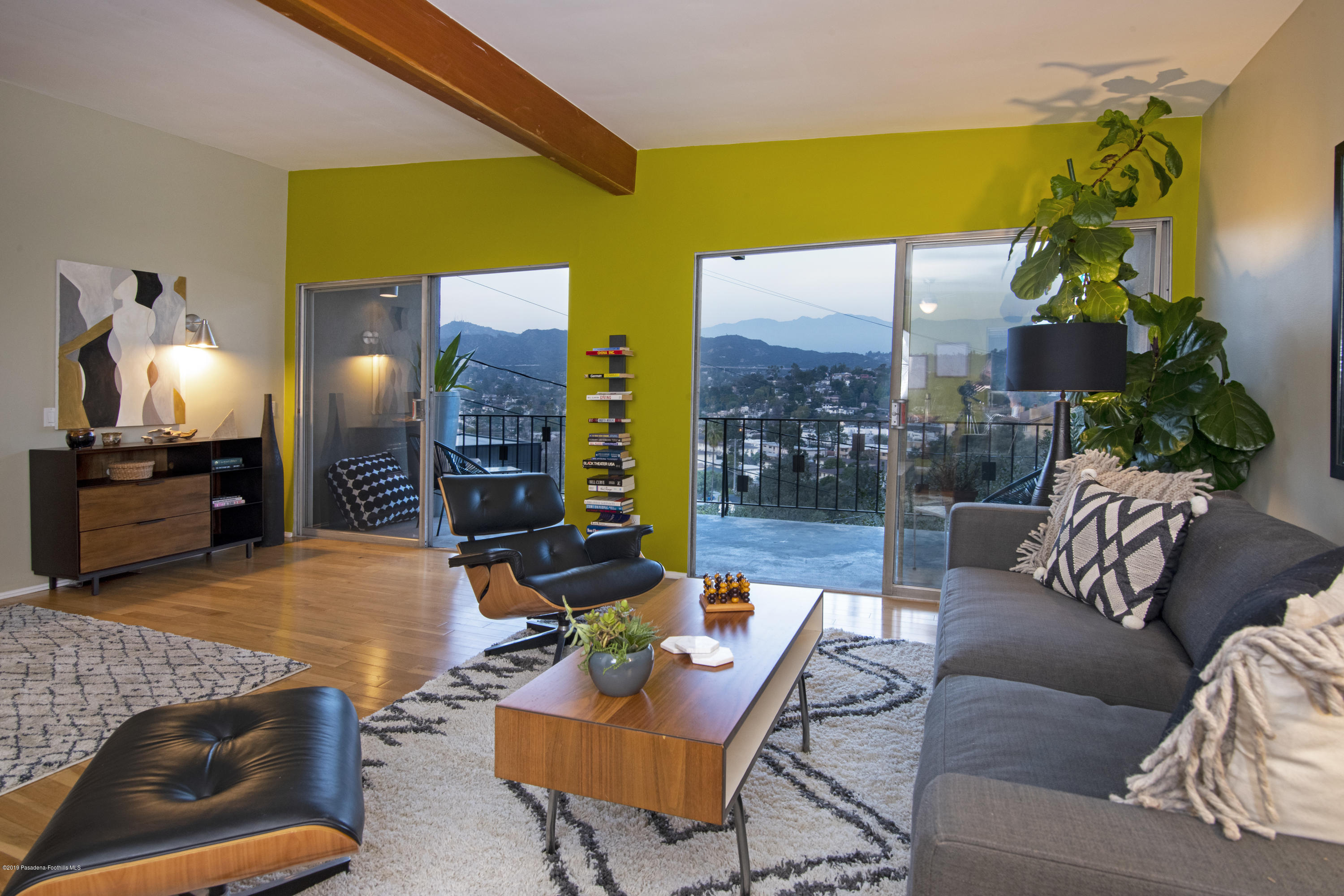 1623 Silverwood Drive Eagle Rock, CA 90041 - Photo 18 of 24 a living room with furniture a lamp and a fireplace