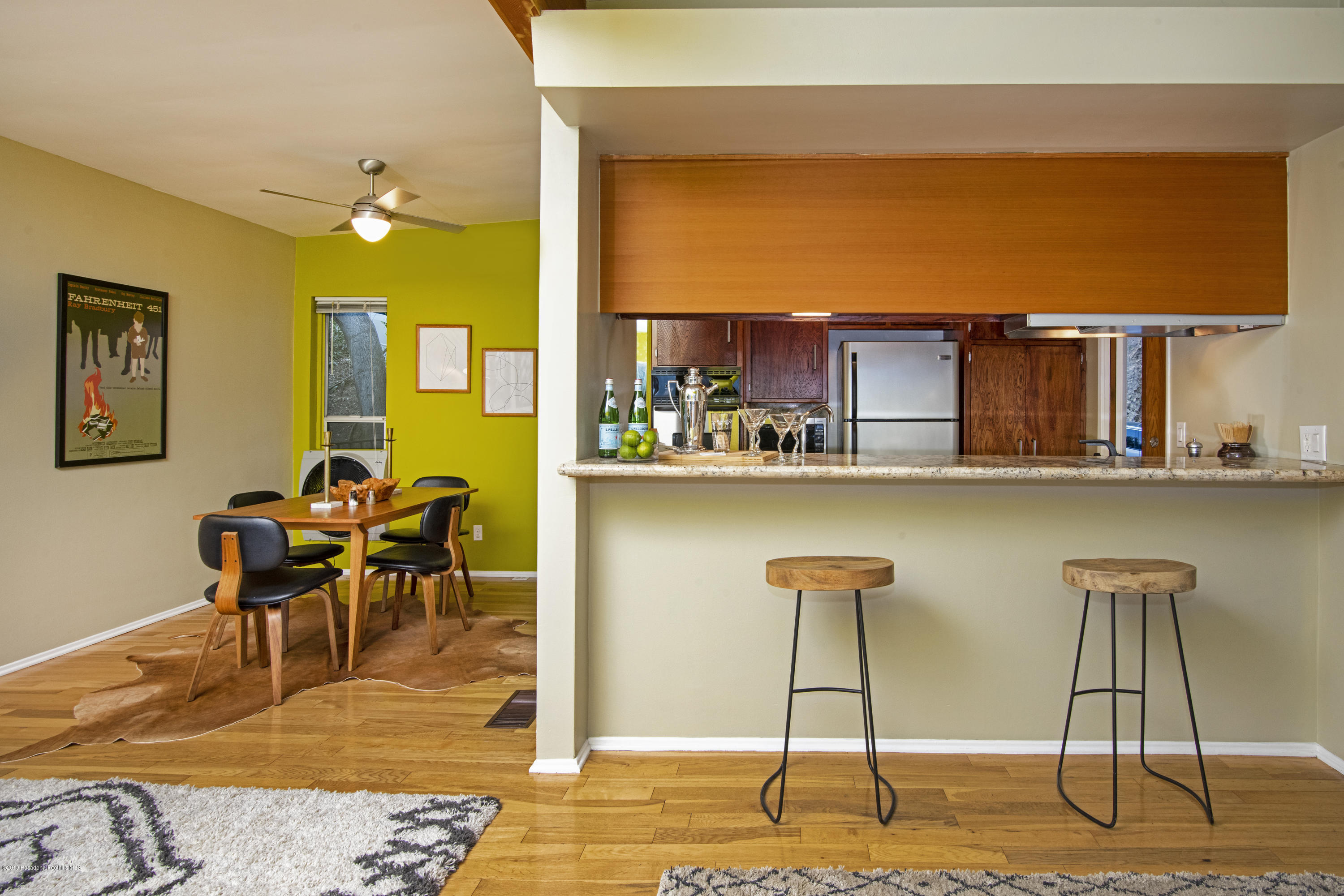 1623 Silverwood Drive Eagle Rock, CA 90041 - Photo 8 of 24 a living room with a table and chair