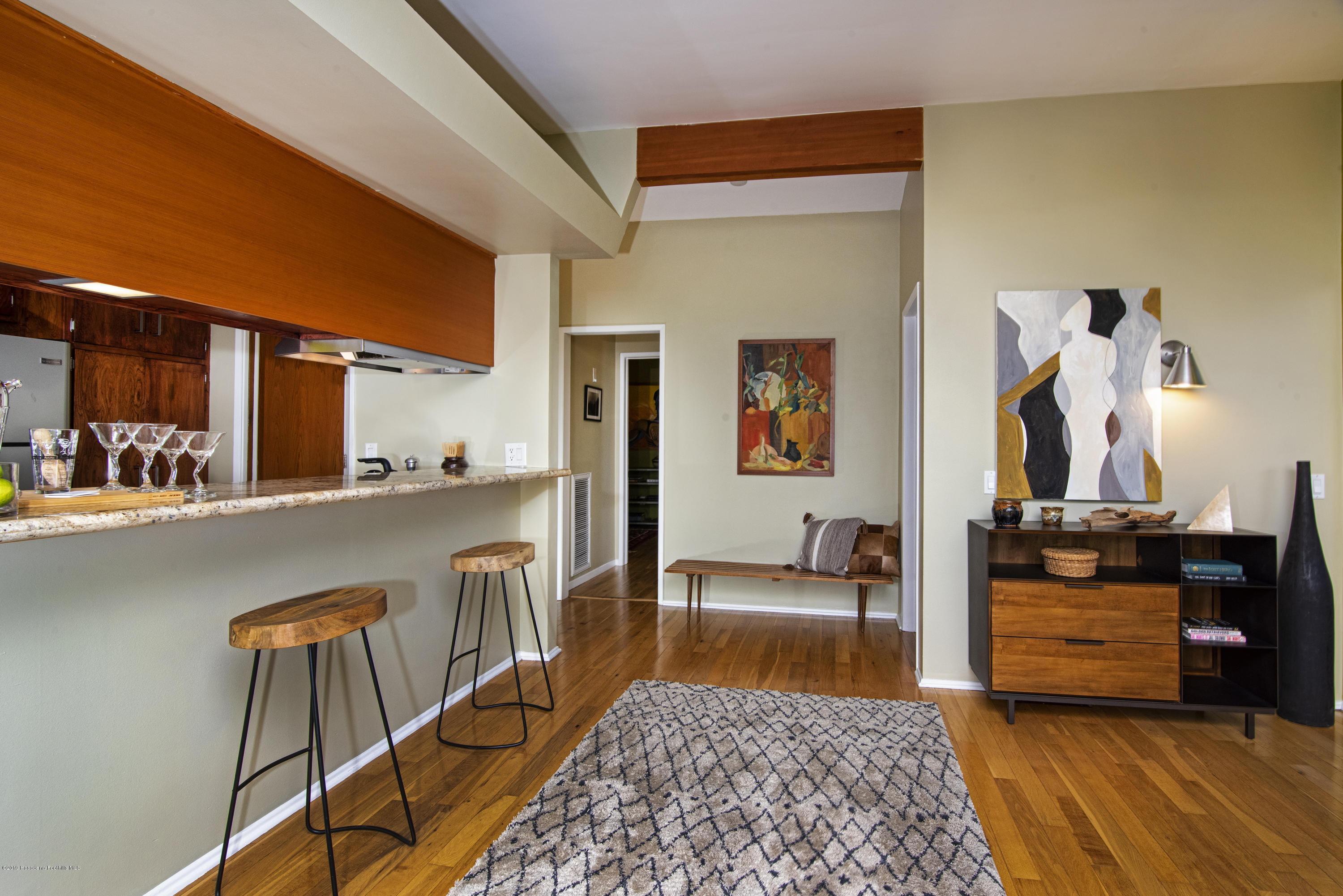 1623 Silverwood Drive Eagle Rock, CA 90041 - Photo 9 of 24 a living room with furniture and a rug