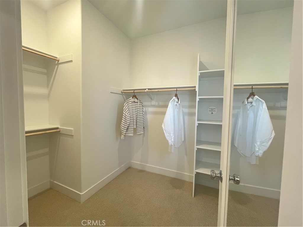 1872 Union, Unit 25 Anaheim, CA 92805 - Photo 20 of 41 Walk-In Closet. Photos are of the model, for reference only. Actual upgrades my vary