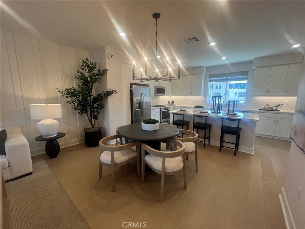 1872 Union, Unit 25 Anaheim, CA 92805 - Photo 7 of 41 Living Area. Photos are of the model, for reference only. Actual upgrades my vary