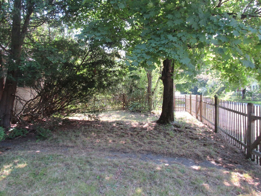 5 Capt Peter Simpson Road Millbury, MA 01527 - Photo 14 of 35 a backyard of a house with trees