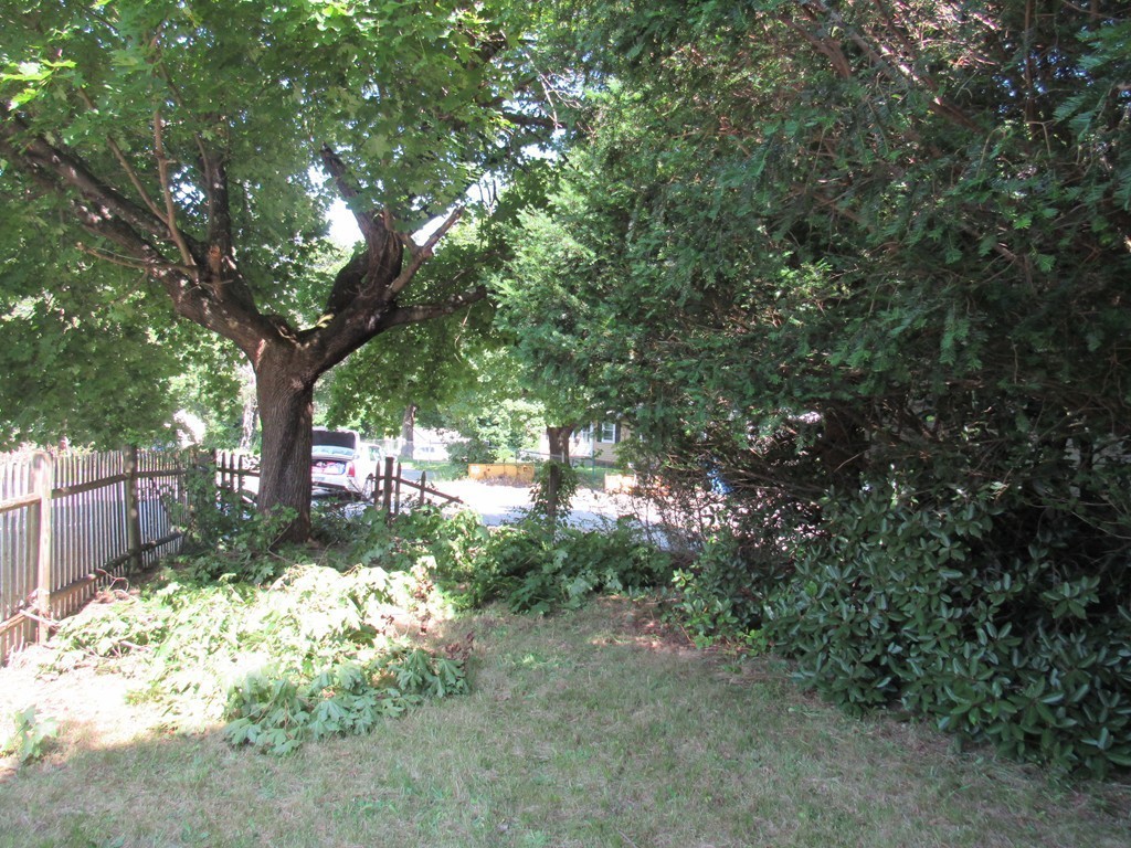 5 Capt Peter Simpson Road Millbury, MA 01527 - Photo 15 of 35 a backyard of a house with lots of green space