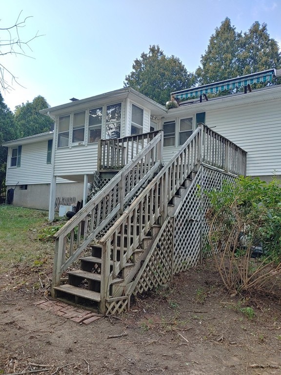 5 Capt Peter Simpson Road Millbury, MA 01527 - Photo 30 of 35 a view of a house with a deck
