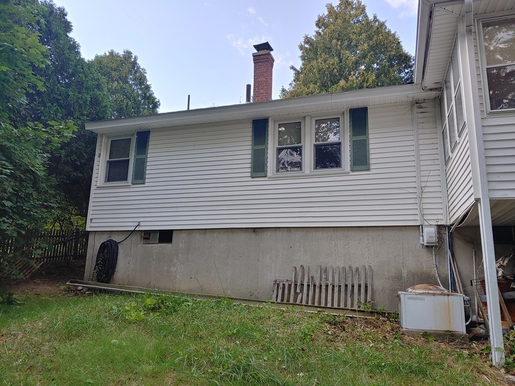 5 Capt Peter Simpson Road Millbury, MA 01527 - Photo 32 of 35 a front view of a house with a yard